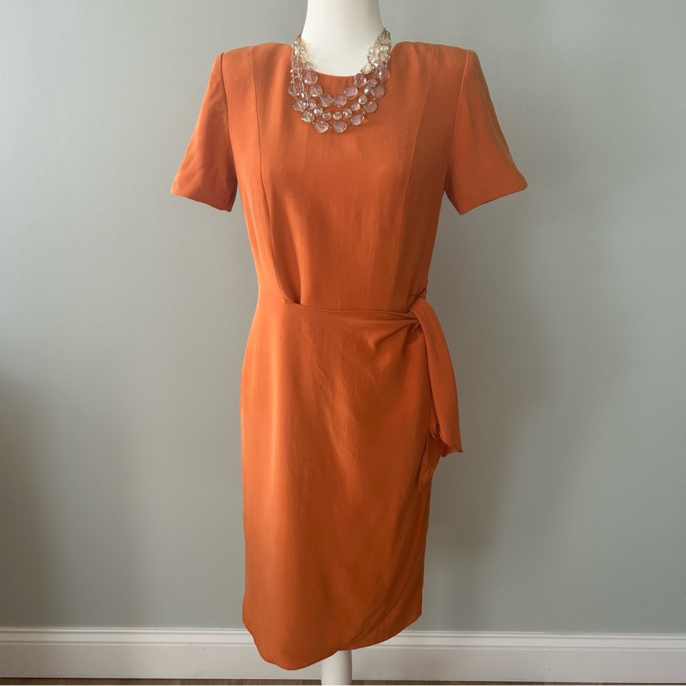 Elegant Orange Midi Dress with Waist Detail